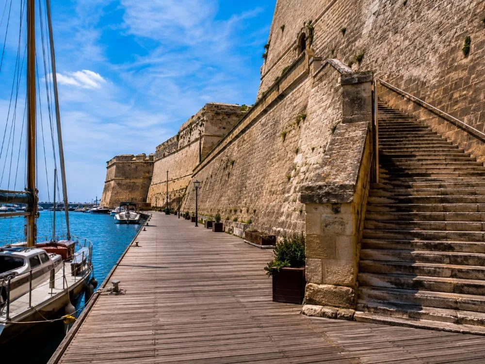 The Harbour Promenade below the walls, reached by the sea-side gate that reopened in 2023.